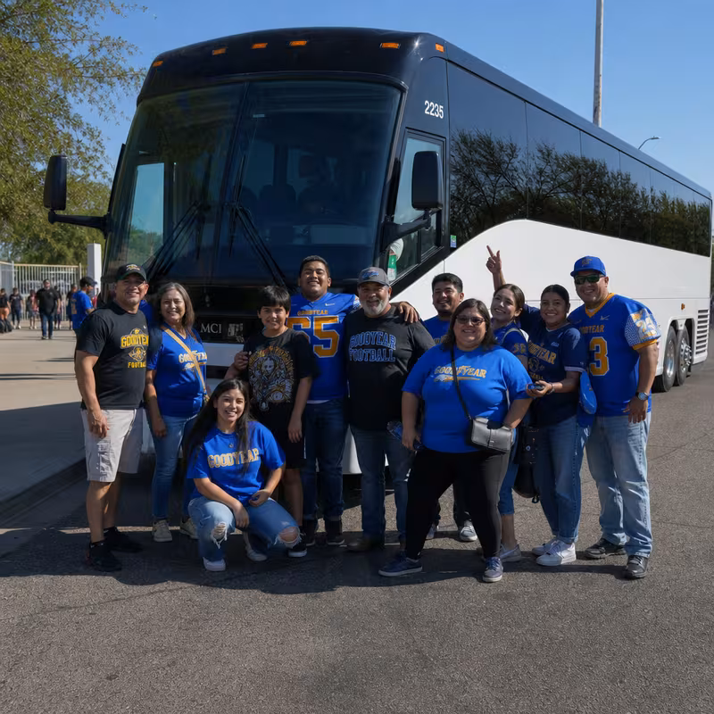 Passengers loading luggage while boarding an Goodyear group shuttle
